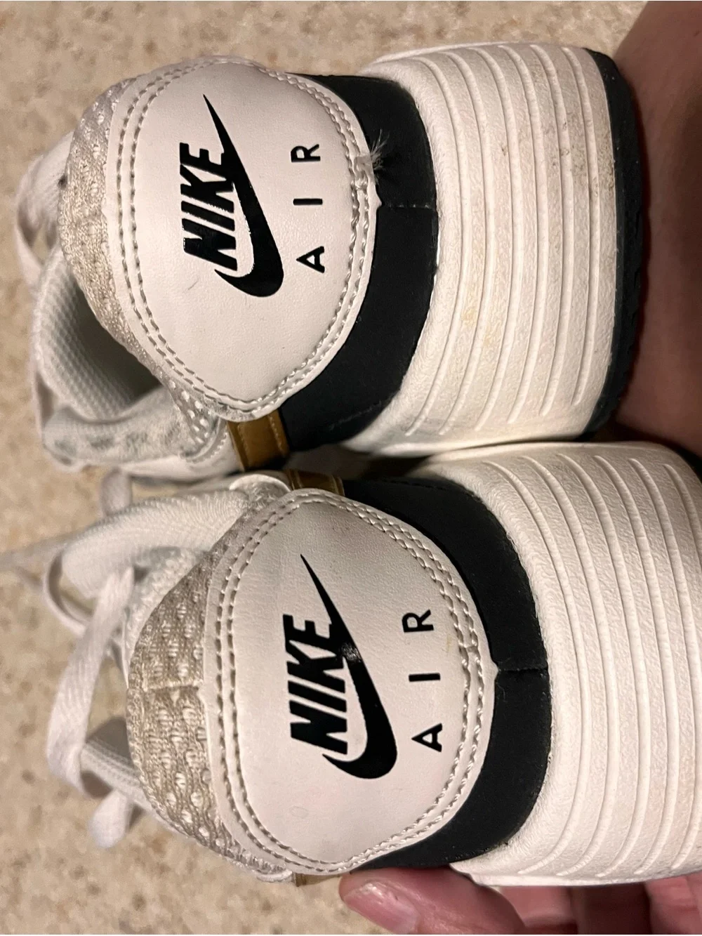 Nike White and Black Mesh Sneakers with Gold Swoosh